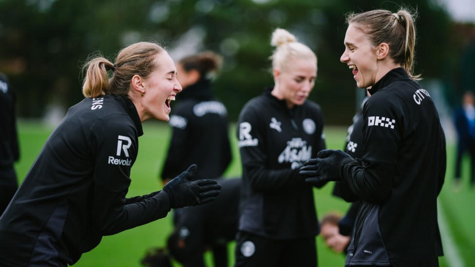 THAT'S THE SPIRIT: Sydney Lohmann and Vivianne Miedema's expressions summed up the positive mood in camp.