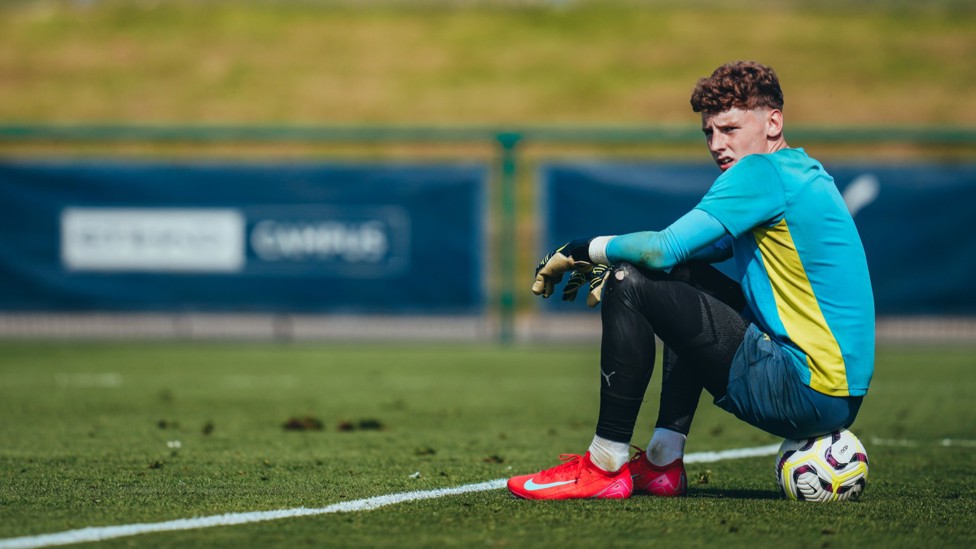 QUICK BREAK : Jack Wint takes a minute to enjoy the sun. 