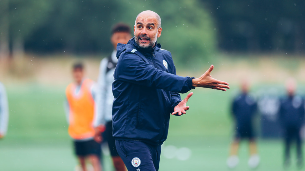 THE BOSS: Pep Guardiola gets his point across to the City players