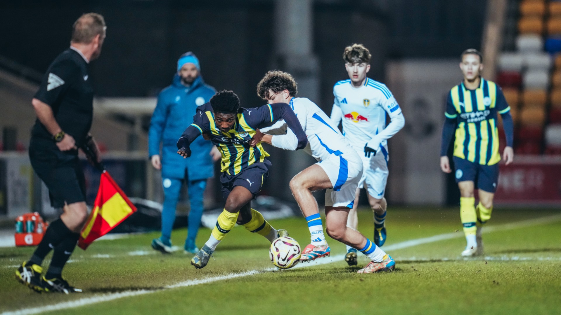 BATTLE  : Ryan McAidoo put under pressure.