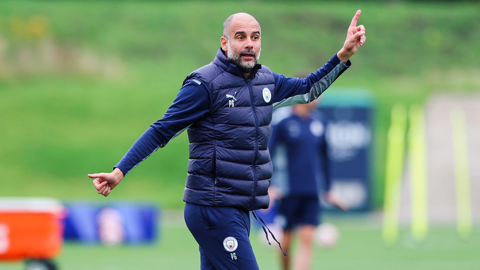 BOSSING IT : Pep Guardiola gives out some instructions during the session
