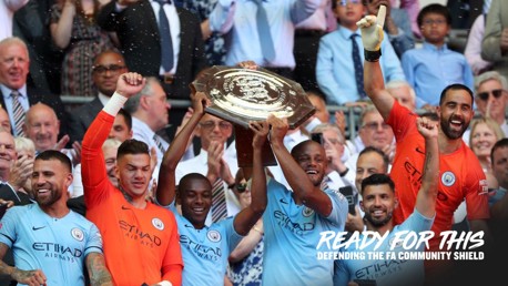 SILVERWARE: Vincent Kompany lifts the Community Shield aloft.