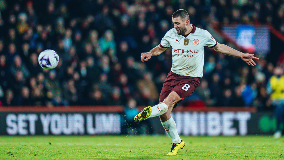 MIGHTY MATEO : Kovacic curls an effort towards goal in search of a second.