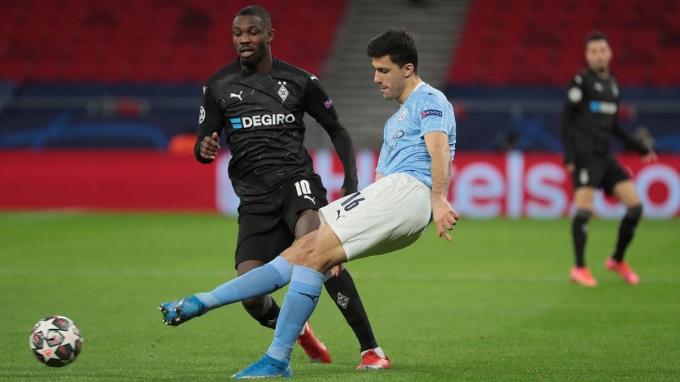 SHIFTING PLAY: Rodrigo zips a pass along the turf