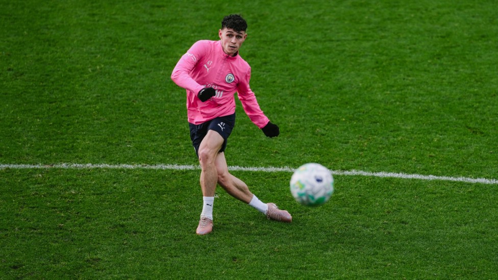 CENTRE OF ATTENTION: Phil Foden fires in a shot.