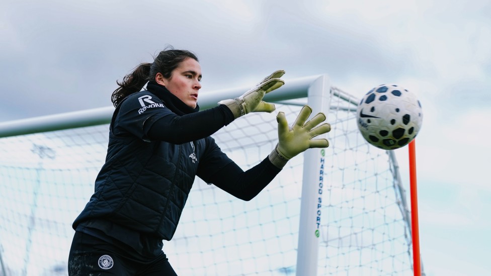 CATCH OF THE DAY : Eartha Cumings claims the ball