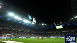 Football match between two teams at a stadium during night time, featuring Manchester City and Atletico Madrid banners. Large crowd in attendance. Part of Asia Tour 2026 presented by experience Abu Dhabi.