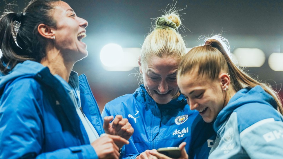 ON THE PHONE : Laura Coombes shares a joke with Leila Ouahabi and Jess Park