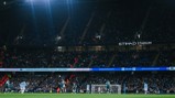 Football match at Etihad Stadium with Manchester City playing against Brighton & Hove Albion. Scoreboard shows Manchester City 1 - Brighton & Hove Albion 2 with 60:40 on the clock.