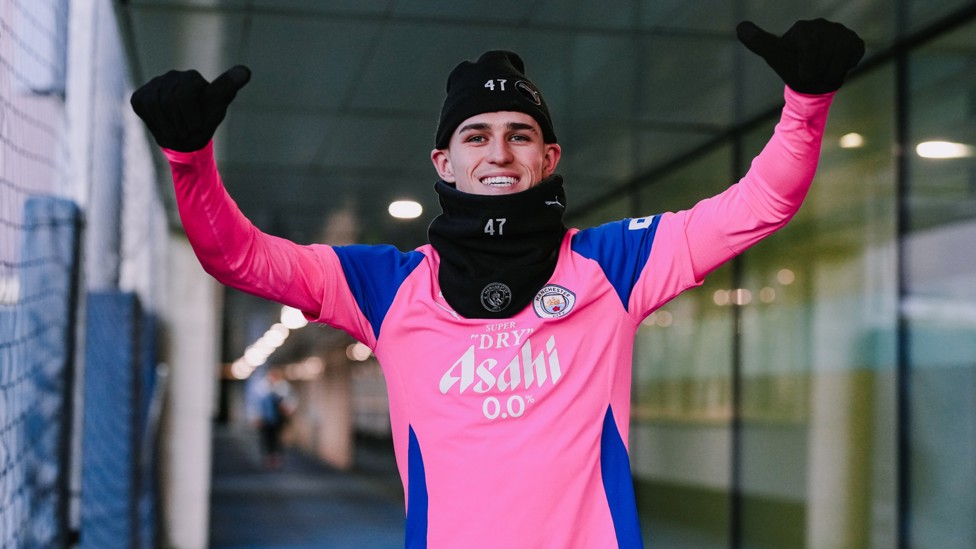 DOUBLE THUMBS UP : Phil Foden spots the camera