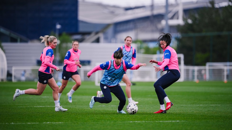 IN THE THICK OF IT: Aoba Fujino is hunted down by her teammates