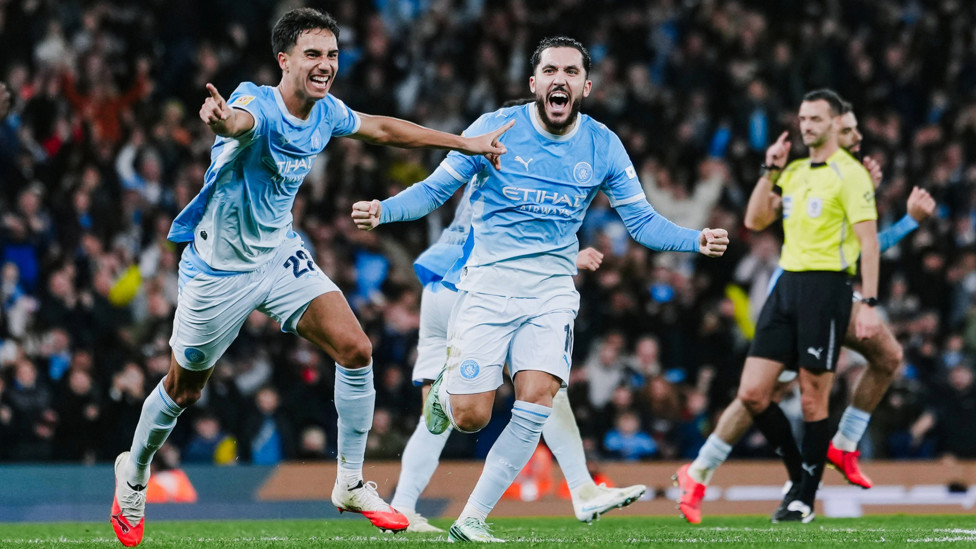 BRAZILIAN BRILLIANCE : Reis wheels away to celebrate after making it 2-2.