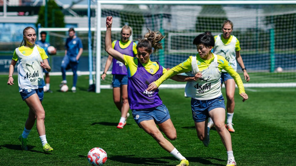 HEAT OF BATTLE : Laia Aleixandri and Aoba Fujino compete for the ball