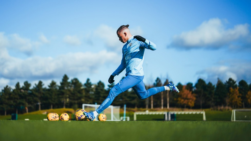 PICKING OUT A PASS : Kalvin Phillips searches for a team-mate