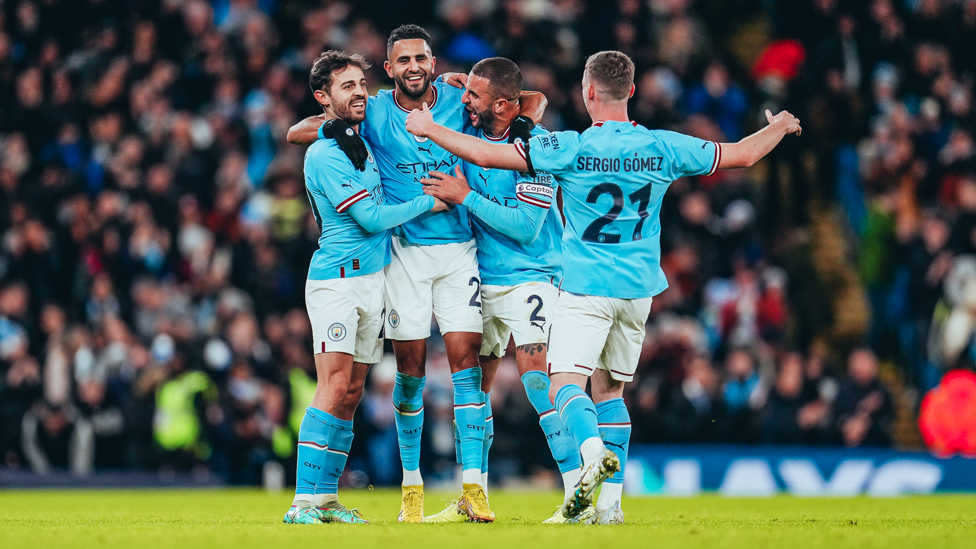 ALL SMILES : The players show their delight after the splendid goal.