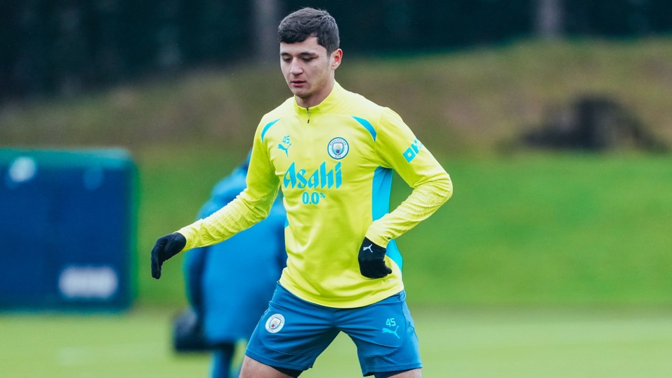 LIMBERING UP : Abdukodir Khusanov in the thick of it