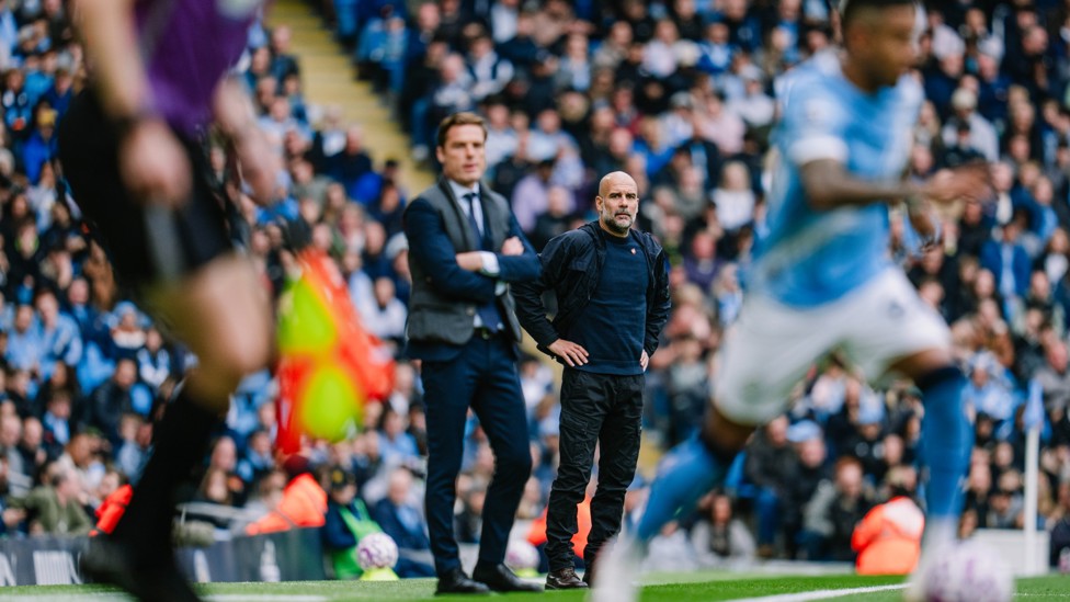 THE BOSS: Pep Guardiola and Clarets counterpart Scott Parker look on.