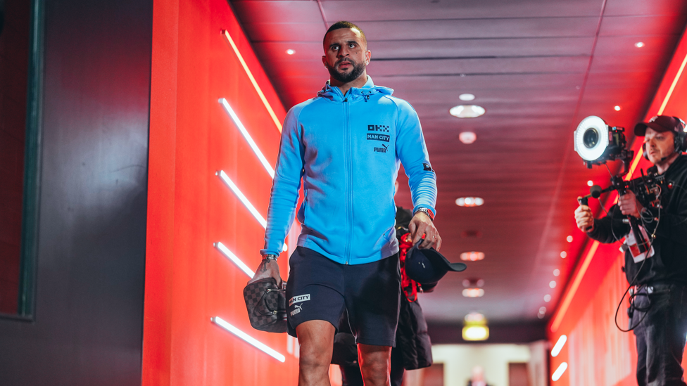 WALK IN : Kyle arrives at the stadium.