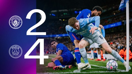 Manchester City 2-4 Paris Saint-Germain score with players in action near the corner flag.