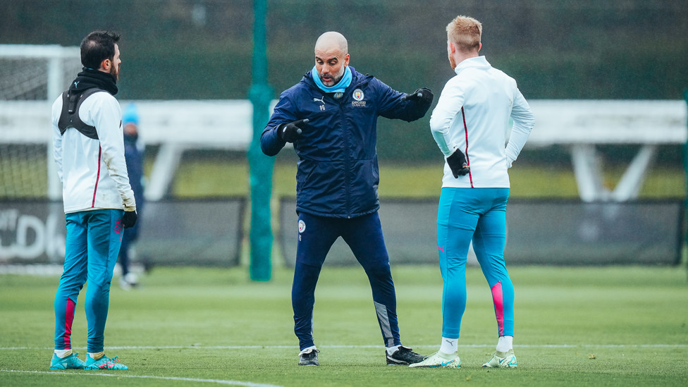 BOSSING IT : Pep Guardiola talks tactics with Bernardo Silva and Kevin De Bruyne