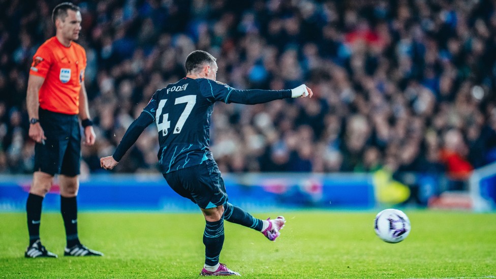 CURLER  : Phil Foden's free-kick finds the net via a deflection. 
