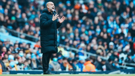 PEP TALK: Guardiola passes on his instructions.