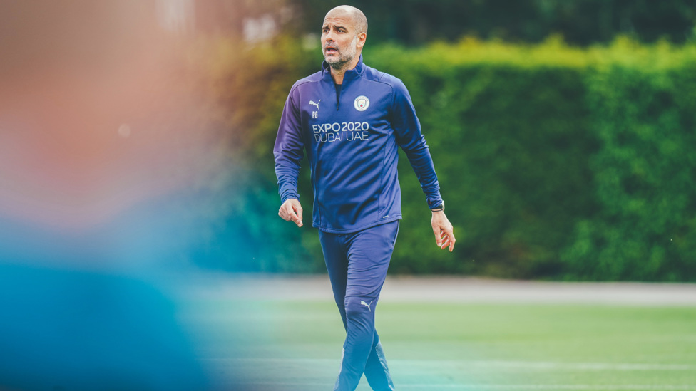 MARCHING ON : Pep Guardiola gets the session started