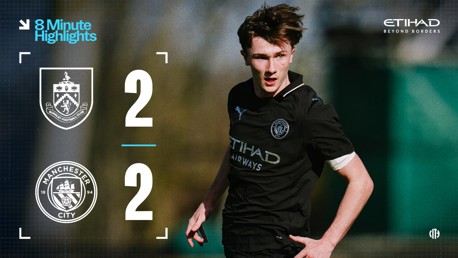 A graphic displaying the score between Burnley FC and Manchester City with both teams scoring 2 goals each. The player is wearing a Manchester City jersey with sponsors and logos visible.
