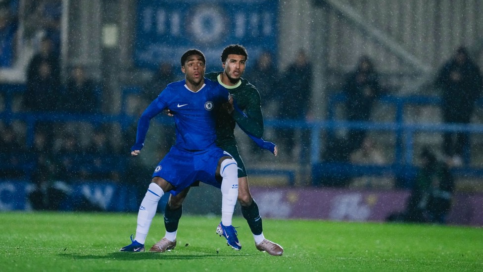 KEEP FIGHTING : Marlow Barrett helps City maintain our lead.