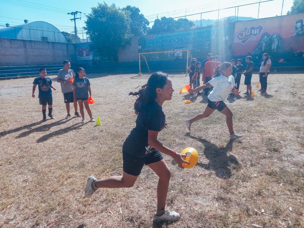 Young Leaders in Barranquilla, Colombia deliver a football festival for young girls and boys in the community