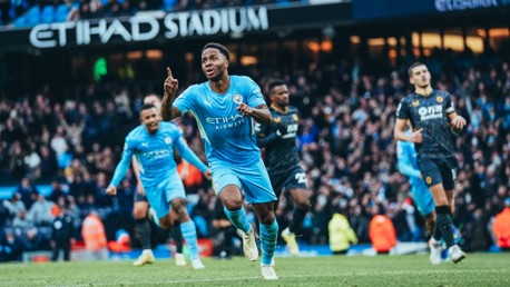 RAHEEM THE DREAM: Sterling wheels away to celebrate.