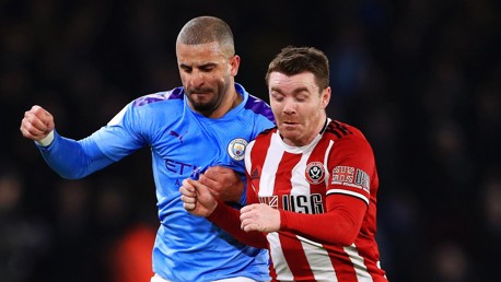FLASHING BLADE: Kyle challenges for the ball at the stadium he once was a fan at