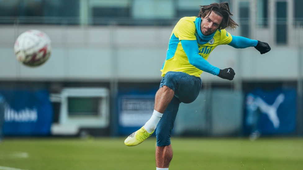 POT SHOT : Jack Grealish fires goalwards in training at the CFA