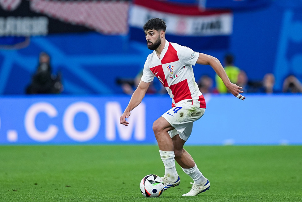 GALIVANTING GVARDIOL : Josko looked to stride forward against Italy.