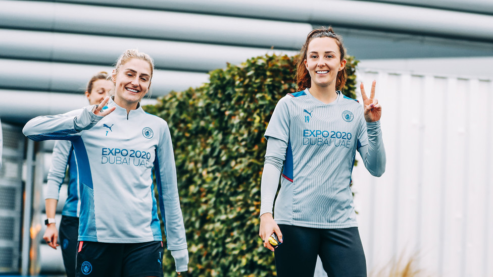 PEACE IN A POD : Laura Coombs and Caroline Weir strike the same pose!