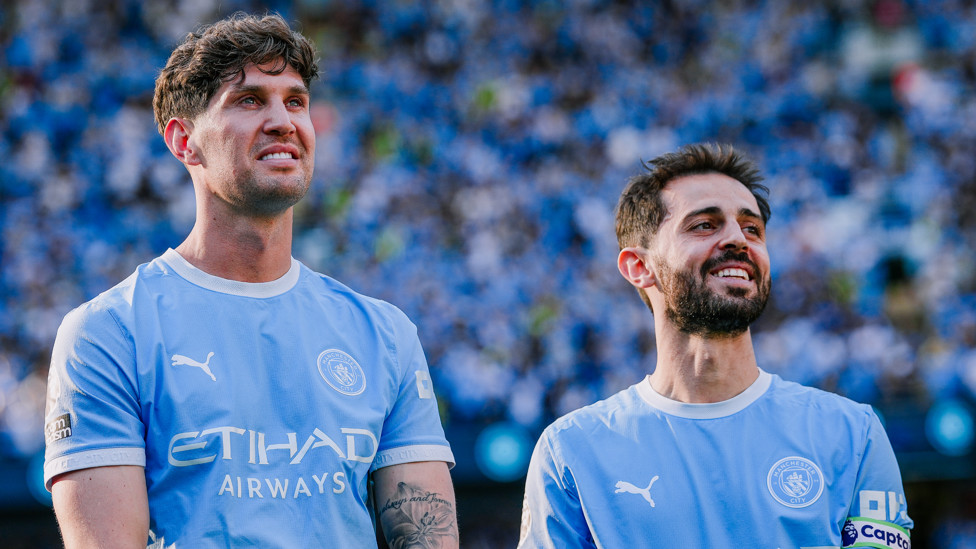 DYNAMIC DUO : Stones and Bernardo watch tributes on the Etihad screens. 