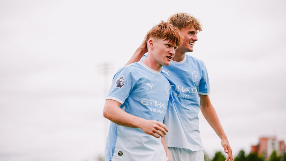 DEFENSIVE DUO : Archie Thornton celebrates his first goal with Freddie Lawrie.
