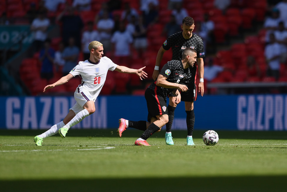 FAMILIAR FACES : Kovacic and Phil Foden battle it out on the international stage during the 2020 Euros