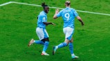 DEADLY DUO: Doku and Haaland celebrate!