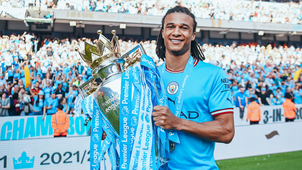 TITLE TREBLE: Ake holds the Premier League title aloft for a third time