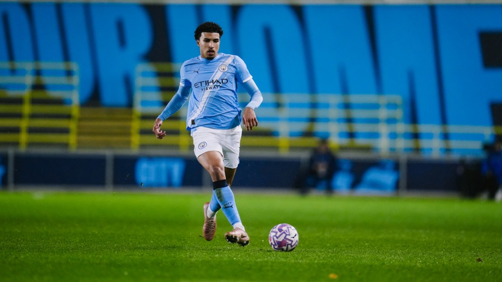 DRIVING FORWARD : Marlow Barrett charges up the pitch.