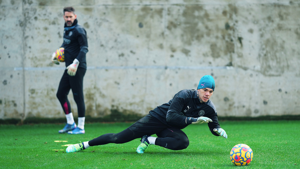 HAND IT TO EDDY: Scott Carson looks on as Ederson gets down to work