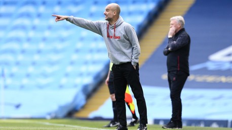 PEP TALK: Guardiola provides instructions from the touchline.