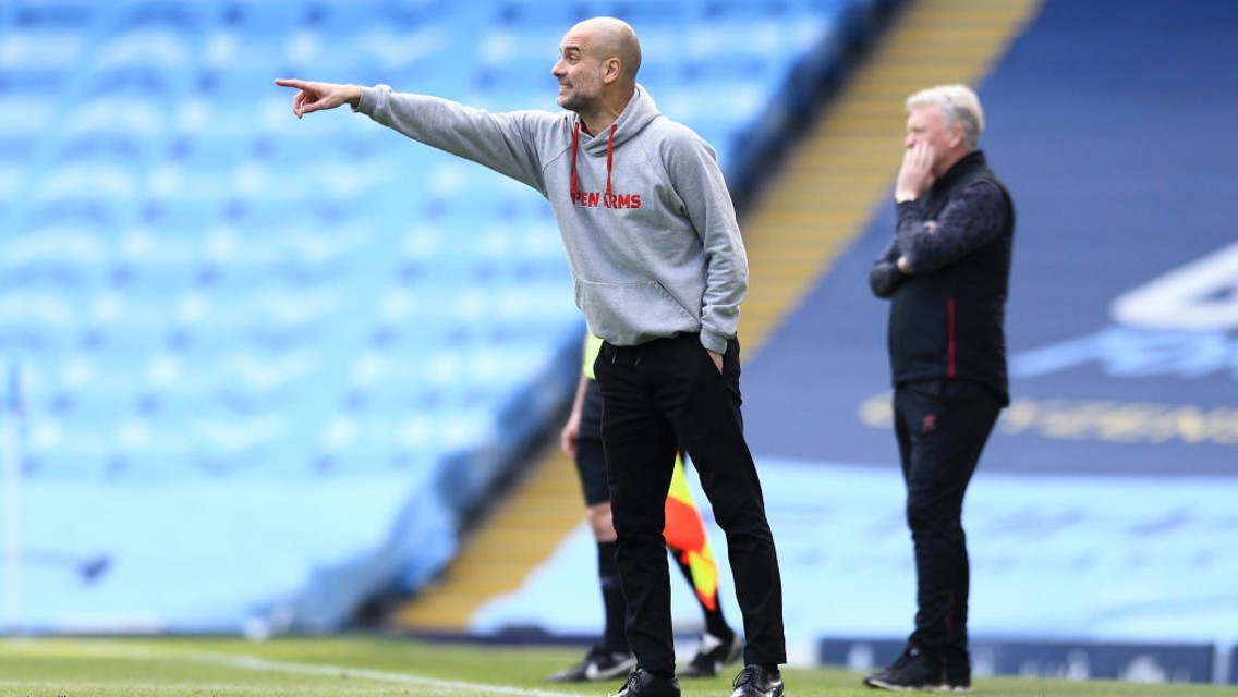 PEP TALK: Guardiola provides instructions from the touchline.