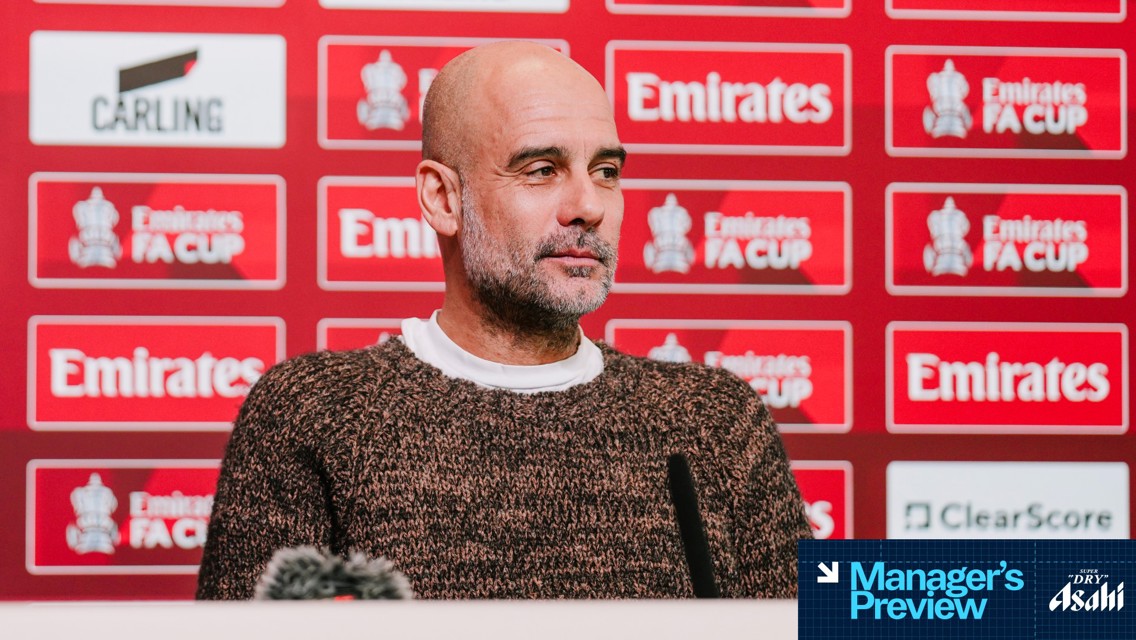 A person is at a press conference with an FA Cup-themed backdrop featuring various logos and the text 'Manager's Preview' and 'Asahi Super Dry'.
