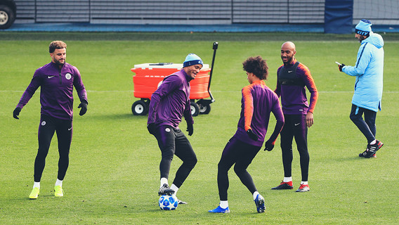 FOUR'S KOMPANY: The skipper has some fun with Leroy Sane