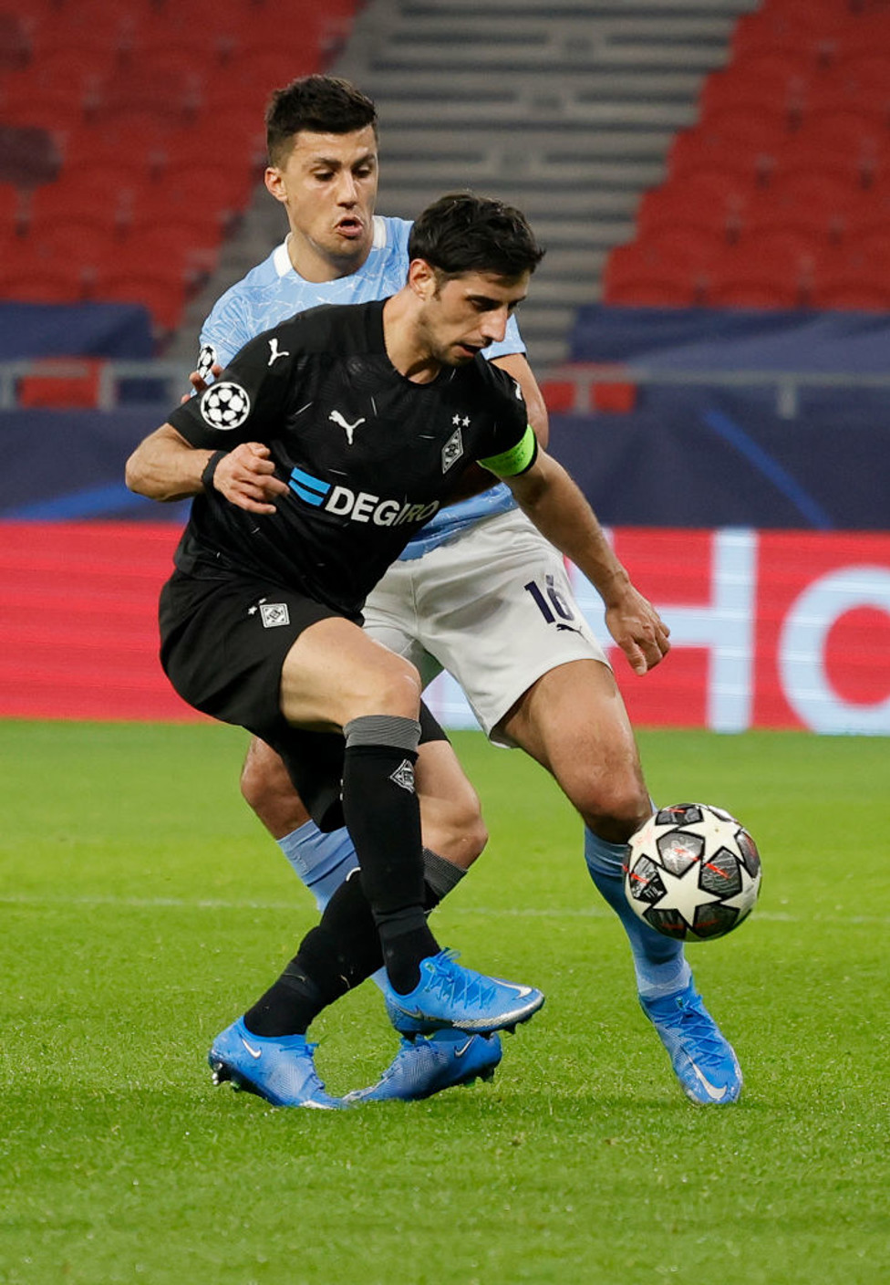 BATTLE : Rodri fights for the ball in midfield with Stindl early on.