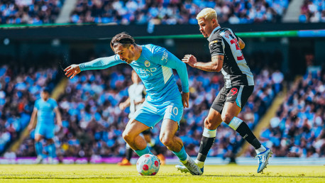 TRIPPED: Grealish gets City forward and is fouled early on.