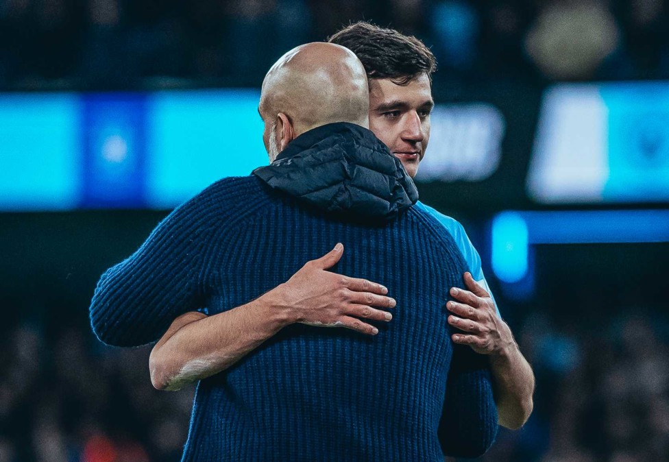 LEARNING MOMENTS : Pep and Khusanov embrace after a difficult but important learning opportunity against Chelsea. 