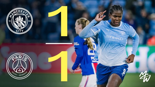 Manchester City Women's team player celebrating after a match with PSG, final score 1-1.